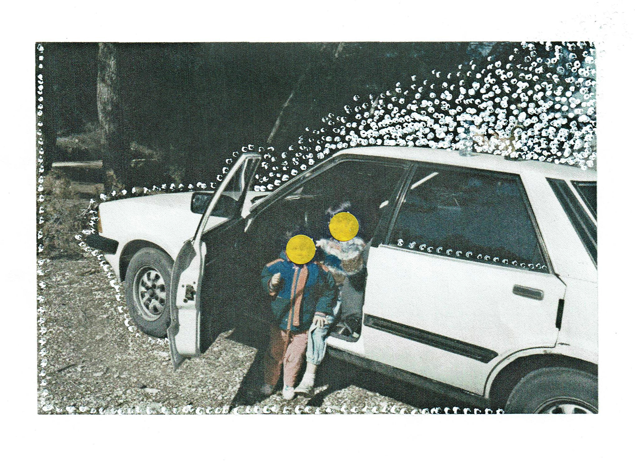 a photo of a family and a car decorated with white dots and yellow circles cover their faces